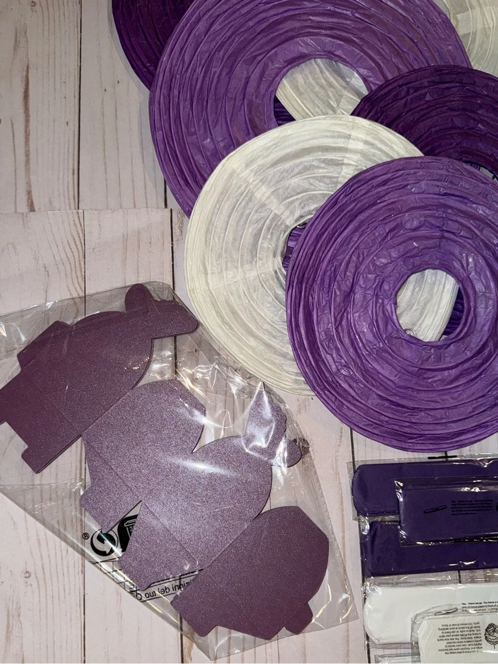 Purple and white party supplies
